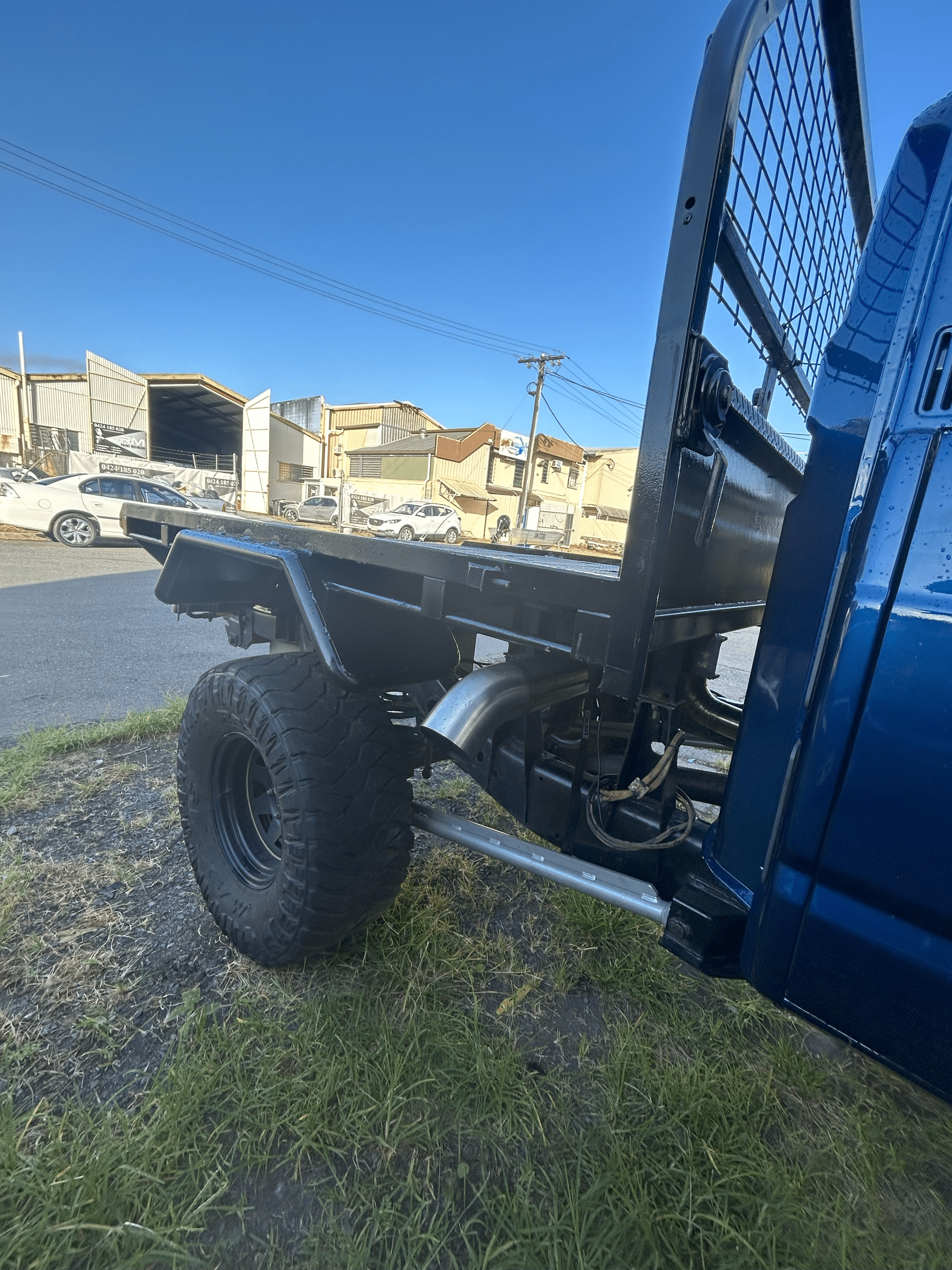 Custom steel mud guards fabricated in Cairns by LJC Industries